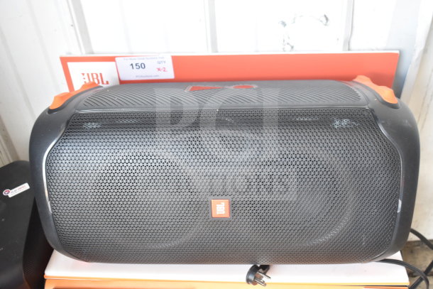 JBL Partybox 110 speaker on store display with orange accents, in good condition. Includes a bid label indicating "2 Times Your Bid."