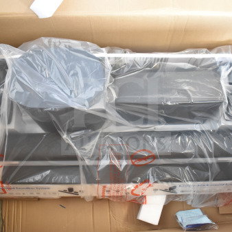 Store display of Onn speakers and soundbars, packaged in plastic wrap. Includes multiple components, in new condition.
