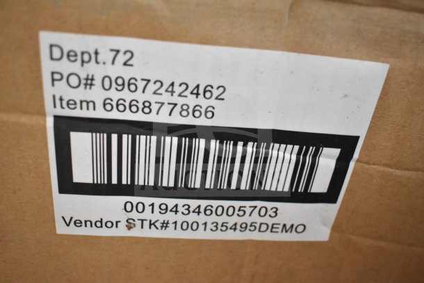 Cardboard box with label; "Dept. 72, PO# 0967242462, Item 666877866, Vendor STK#100135495DEMO", below barcode.