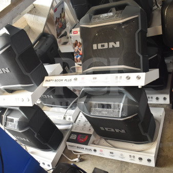 5 Ion Party Boom Plus speakers on display, featuring robust design and enhanced sound capabilities. New condition.