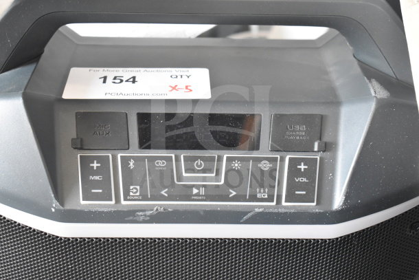 Ion Party Boom Plus speaker, good condition, control panel with mic/aux, USB, volume, and Bluetooth buttons. Auction tag QTY X-5.