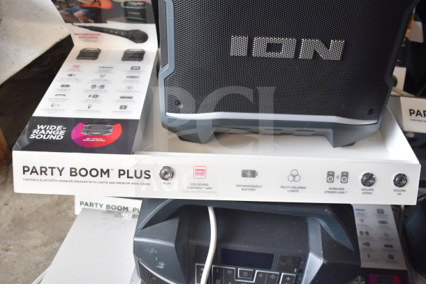 Ion Party Boom Plus speaker display, featuring wide-range sound, rechargeable battery, multi-colored lights, and wireless control.