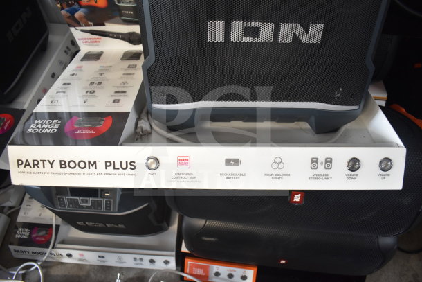 Ion Party Boom Plus speaker display, Bluetooth enabled, rechargeable battery, multi-colored lights, and wide-range sound.
