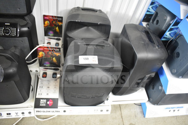 Three Ion Pro Glow Ultra speakers, 300-watt audio, store display, labeled "159 QTY x3," includes product brochures.