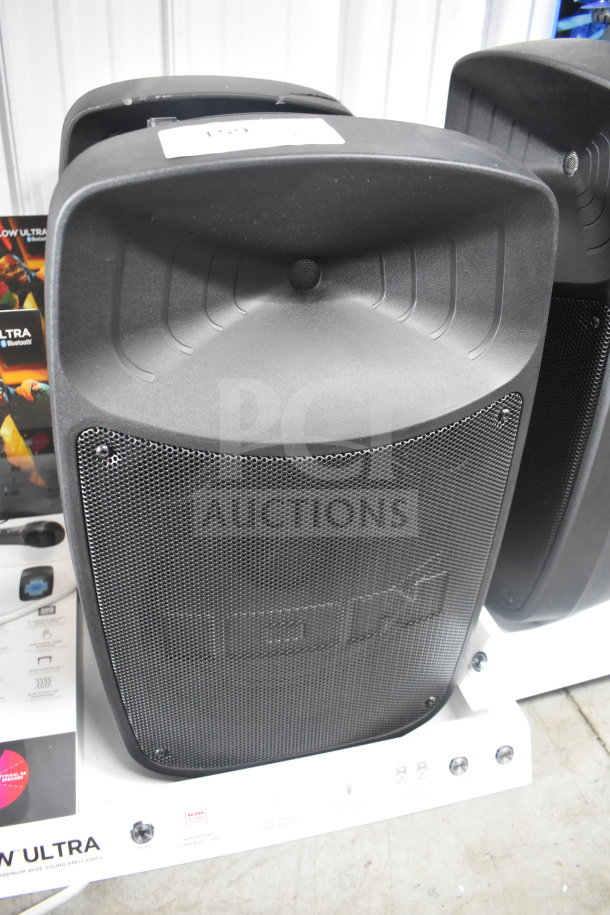 Ion speaker display, featuring three speakers with mesh grills in good condition, ideal for enhancing audio experiences.