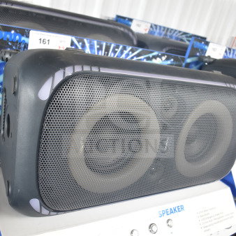 Onn large party speakers on display, featuring Bluetooth, 12-hour playtime, and 160 watts. Auction includes four speakers.