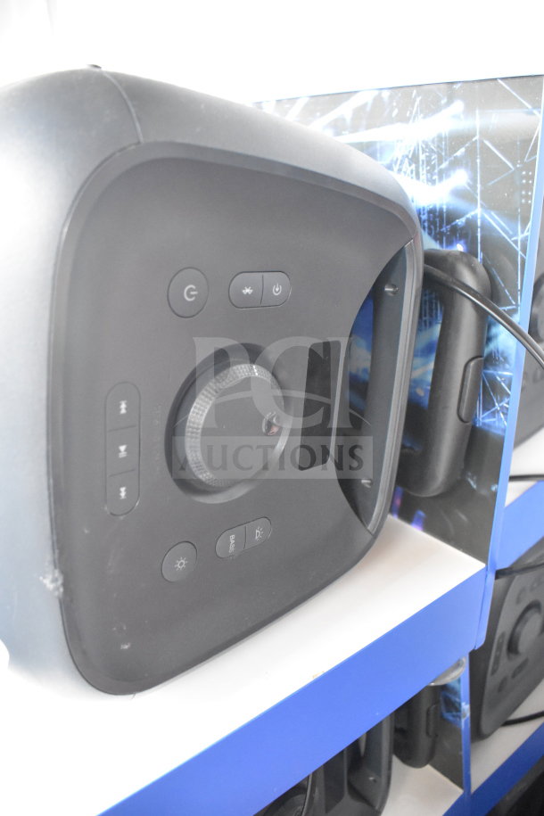 Onn large party speaker, store display model. Features volume knob, power and Bluetooth buttons, in good condition.