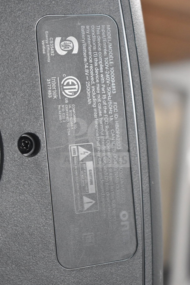 Onn large party speaker display with visible model label, includes input details, FCC compliance, and battery capacity. Model: 100094813.