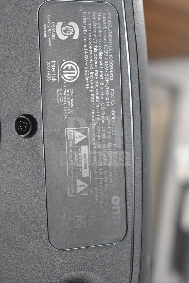 Onn large party speaker back label showing model 100094813, input details, compliance, and safety warnings.