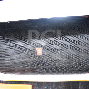 JBL Partybox 110 speaker in excellent condition, features black grille with JBL logo. Part of a 6-store display auction.