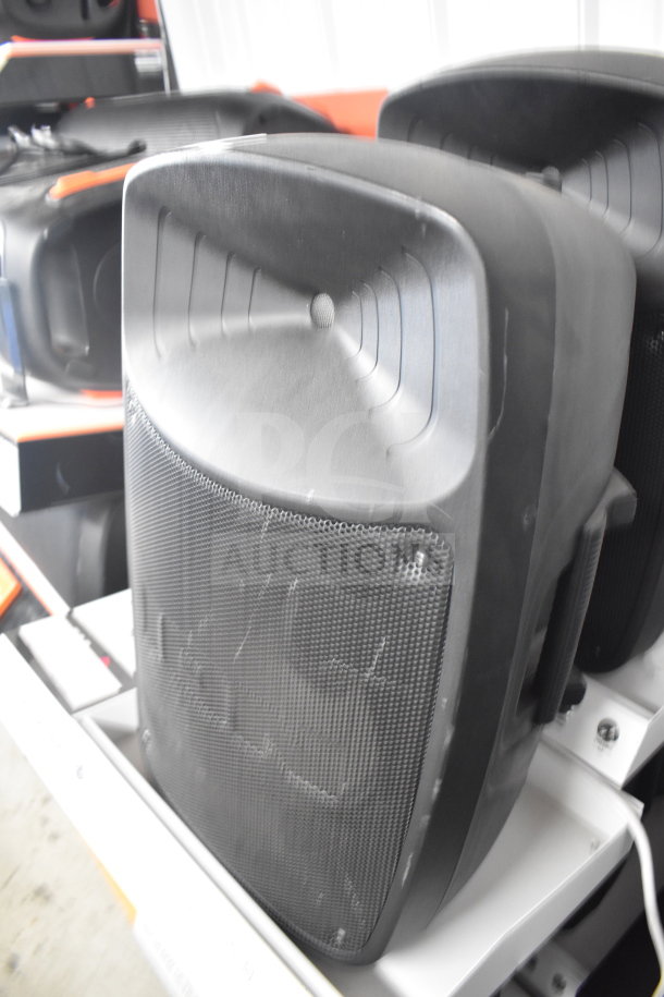 4 Ion Pro Glow Ultra Speakers, black, store display units. Slight surface wear, ideal for audio enthusiasts.