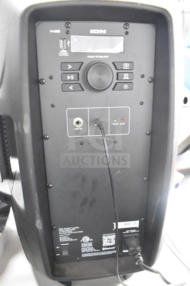 Ion Pro Glow Ultra speaker, black, rear panel view showing control buttons, input ports, and power cord. Store display included.