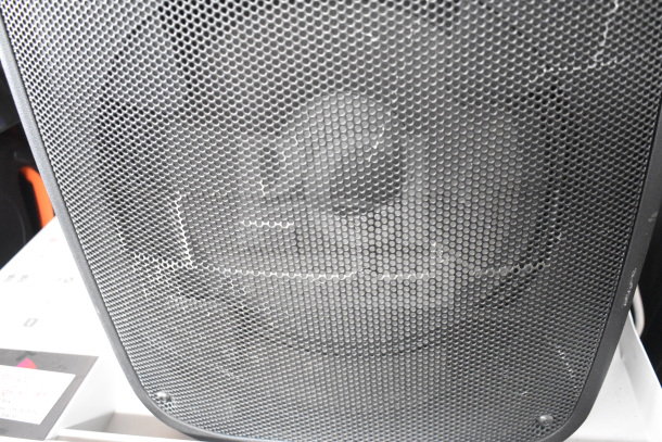 Ion Pro Glow Ultra speaker on display, featuring mesh grille, sleek black design, part of 4-store display set.