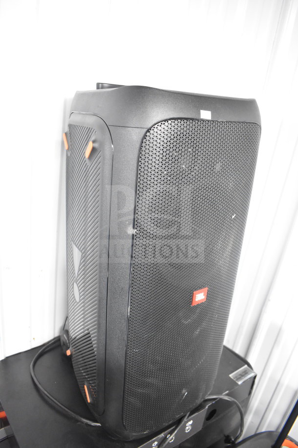 JBL Partybox 310 speaker, black, store display model, minor scuffs, distinctive JBL logo, includes power cable, in good condition.
