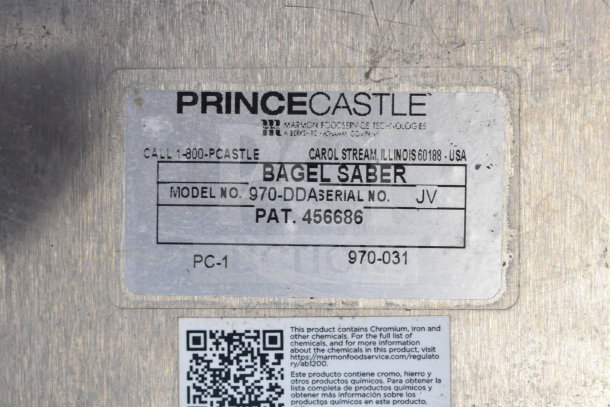 Prince Castle 970-DDA Bagel Saber label with model and serial number JV, Patent 456686, and safety information QR code.