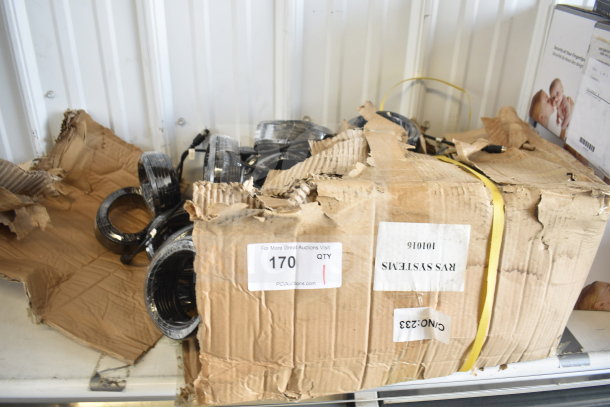 Box of multiple 10m cables in damaged packaging, labeled with "RVS Systems 101010" and "C/NO: 233."