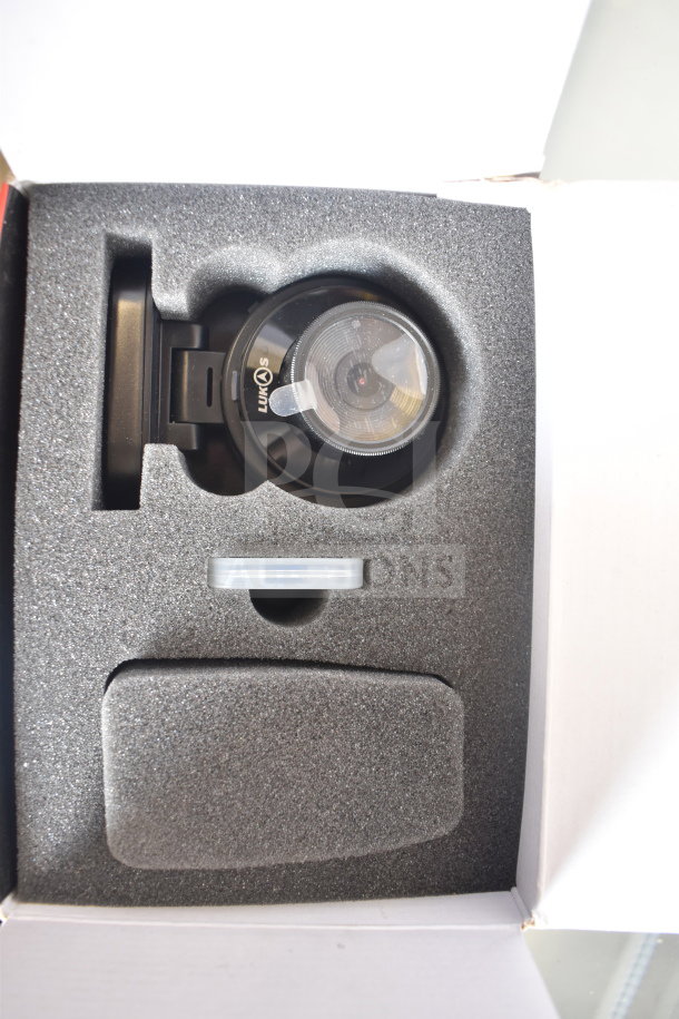 Lukas Blackbox Driving Recorder in original box, new condition, securely packed in foam insert, branded lens visible.