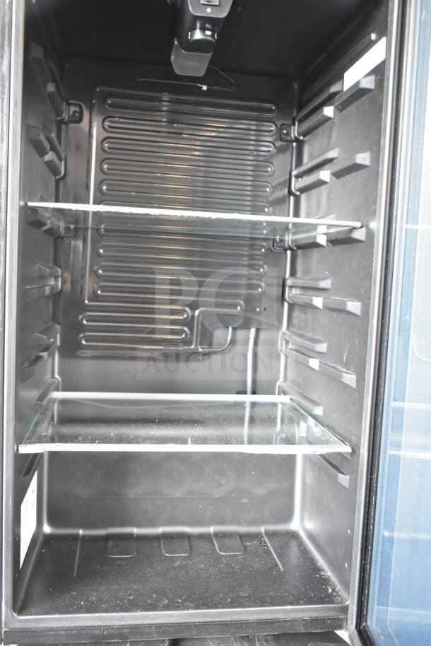 Arctic King ARV115B1AST Mini Cooler Merchandiser, 115 volts, 1 phase. Features adjustable glass shelves, black interior.