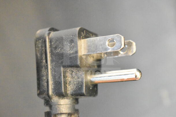 Image of an Arctic King ARV115B1AST cooler's three-prong power plug, indicating it operates on 115 volts, 1 phase.