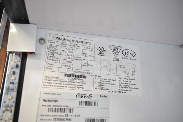 2023 IDW G-4SI-N-2-3-4-B-5 Mini Cooler Merchandiser tag showing specifications: 115V, 1 Phase, 4.3 cu. ft., R600a refrigerant.