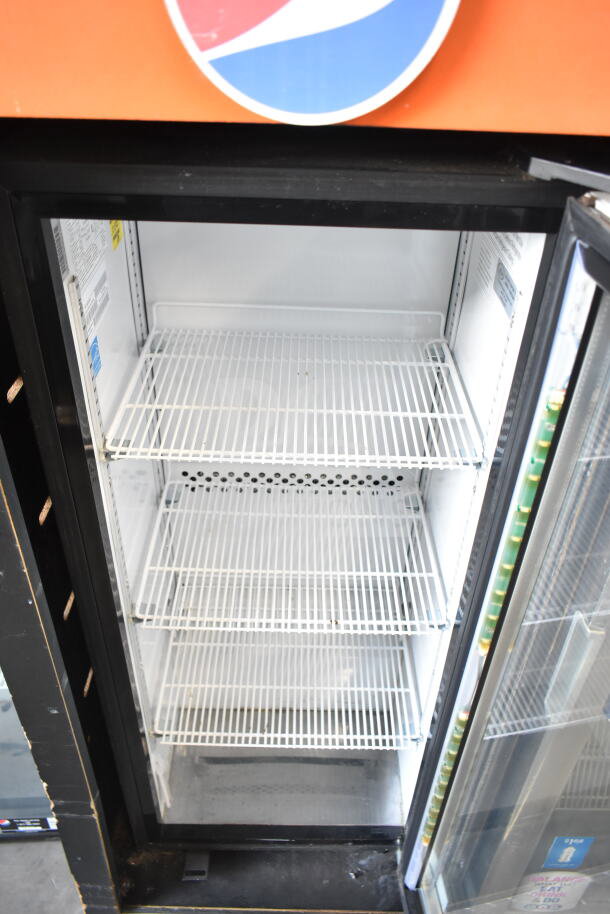 IDW G4-H0234B mini cooler merchandiser, 2019. Features glass door, three wire shelves. 115 volts, 1 phase. Clean interior.