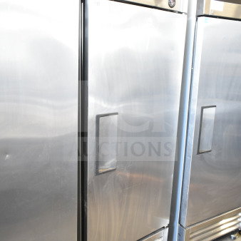 True T-19F commercial single-door freezer on casters, 115 volts, 1 phase, stainless steel finish, good condition.