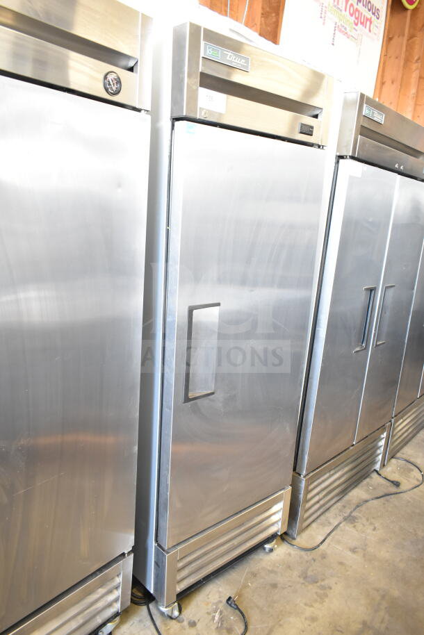 2018 True T-19F-HC single door reach-in freezer, stainless steel, on casters. 115V, 1 phase. Appears in good condition.