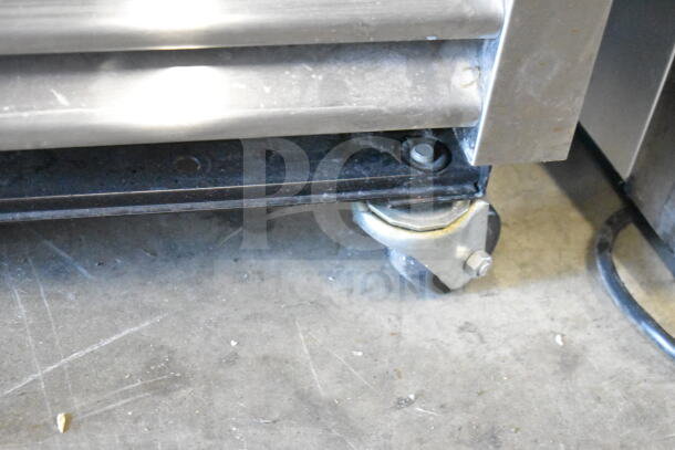 2018 True T-19F-HC commercial freezer caster, showing sturdy design and mobility. 115 volts, 1 phase.