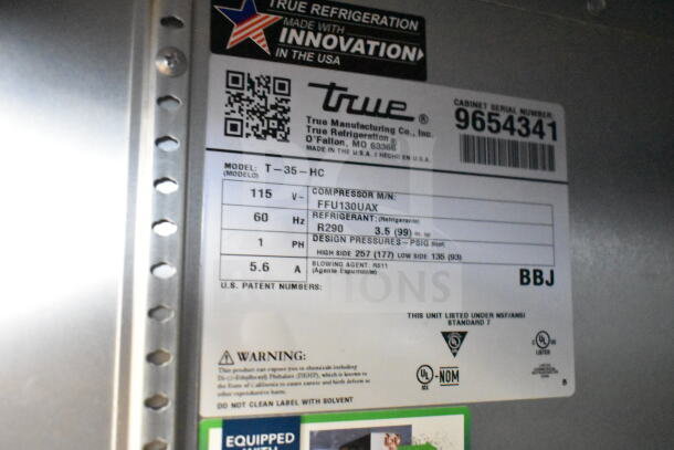 2019 True T-35-HC Commercial Cooler label showing model, voltage, refrigerant details, and serial number.
