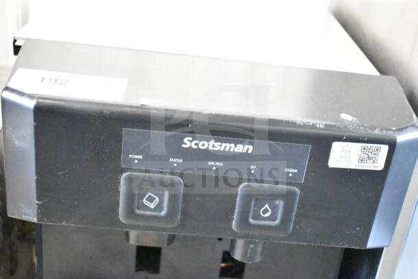 Scotsman W-HID207ABX-1A ice and water dispenser, 196 lb capacity, push-button, visible controls, QR label, excellent condition.