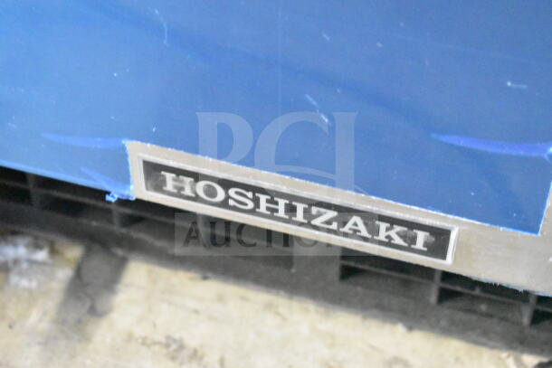 2024 Hoshizaki AM-50BAJ-DS Top Hat Cuber. Missing door. 115 volts, 1 phase. Silver Hoshizaki label visible.