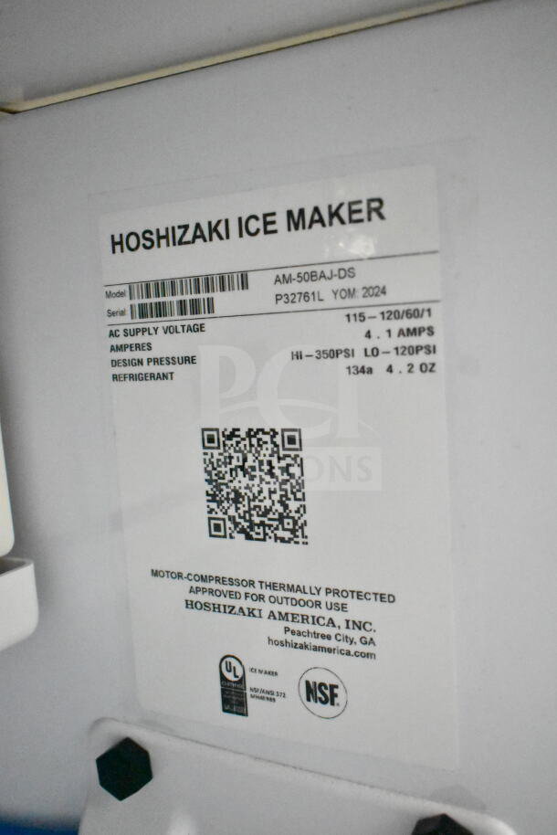 2024 Hoshizaki AM-50BAJ-DS Top Hat Cuber Icemaker. Missing door. 115V, single-phase. Features barcode and QR code on label.