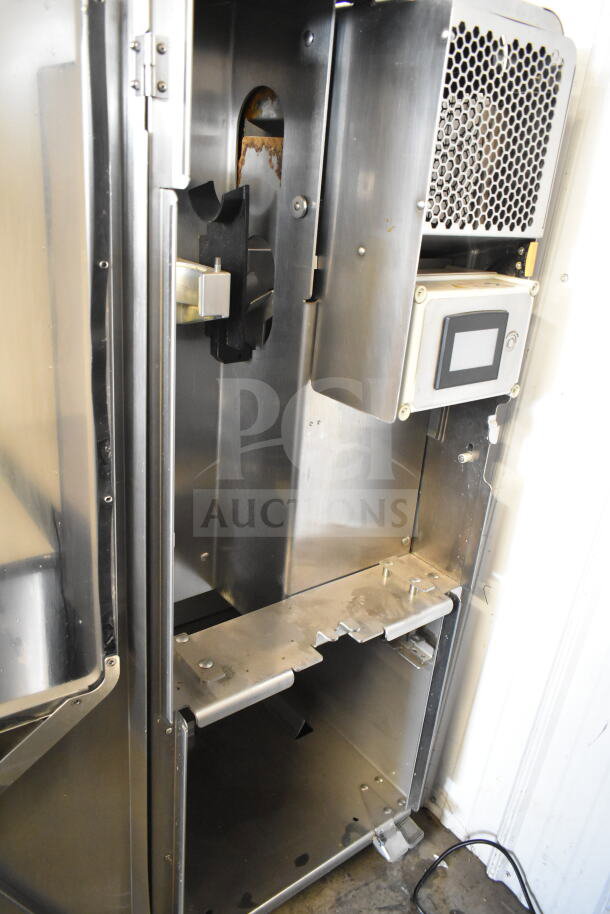 LATE MODEL! JBT 2ND-GEN-MFJ-HE commercial citrus juicer with stainless steel interior, visible casters, and control panel; 115V, 1 phase.