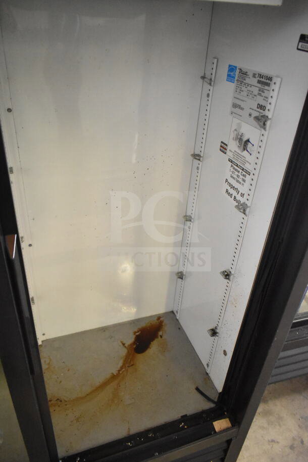 True GDM-41SL-60-LD commercial reach-in cooler, 2 doors, visible interior wear, 115V, 1 phase, model tag present.