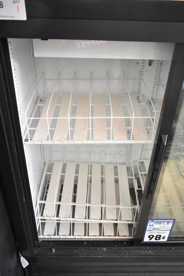 2019 True GDM-41SL-54-HC-LD commercial 2-door cooler merchandiser; features white interior shelves; 115V, 1-phase.