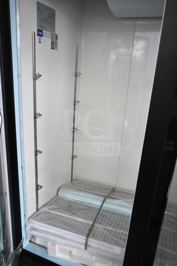 Avantco 178GDC49FHCB commercial cooler, brand new, with glass damage. Two-door reach-in merchandiser, 115V, 1 phase.