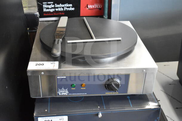 Brand new Carnival King 382TCM16M 16" non-stick crepe maker with spatula and spreader. Voltage: 208/240, 1 Phase.