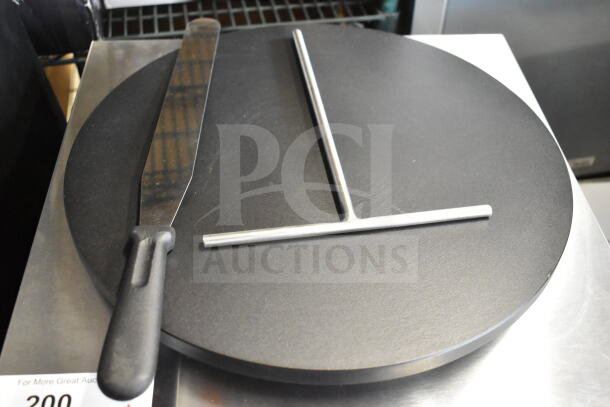 Carnival King 16" non-stick crepe maker, model 382TCM16M, 208/240V. Includes spatula and spreader, scratch and dent condition.