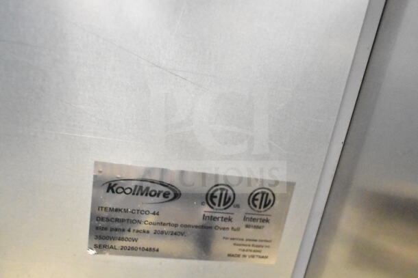 KoolMore KM-CTCO-44 countertop convection oven label showing model, voltage, wattage, and certification. Made in Vietnam.