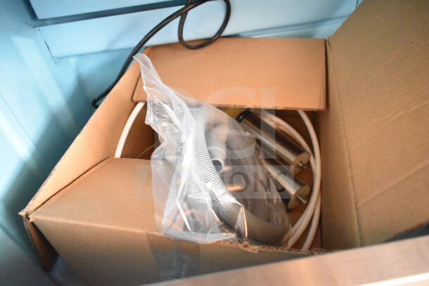 Brand new Avantco Ice Machine model 194EUCH230A parts in box; includes hoses and stainless components.