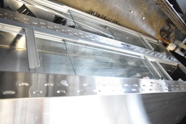 Hatco GR1DH-4PD Stainless Steel Glo-Ray Merchandiser, brand new, 59 3/8" dual shelf, humidity chamber, minor scratches.