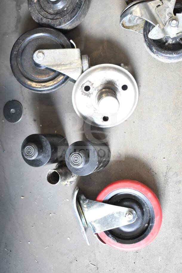 Various commercial casters and a table base piece, mixed materials, used condition, auction lot of 10 items.