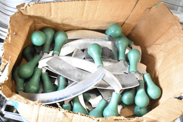 Box of 60 sharpened stainless steel knives with green handles, includes rocking and serrated knives.