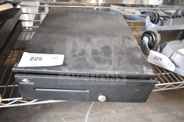 Black countertop cash drawer with lock, minor surface wear, visible brand label; item number tag "225."