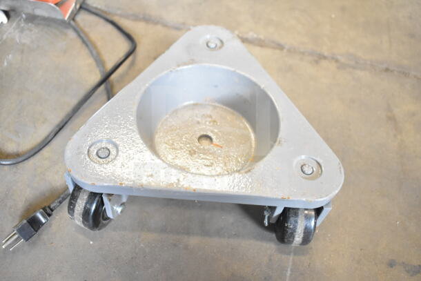 2 862330DOLLYPH Bond cast steel triangular cup dolly, 750 lb. capacity, phenolic casters, slight wear visible.