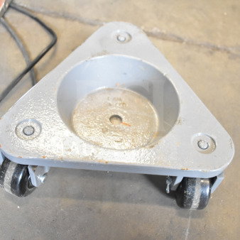 2 862330DOLLYPH Bond cast steel triangular cup dolly, 750 lb. capacity, phenolic casters, slight wear visible.