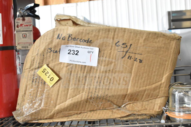 Box of paper bags, marked "No Barcode," auction lot 232, with visible wear and a label indicating quantity and auction site.