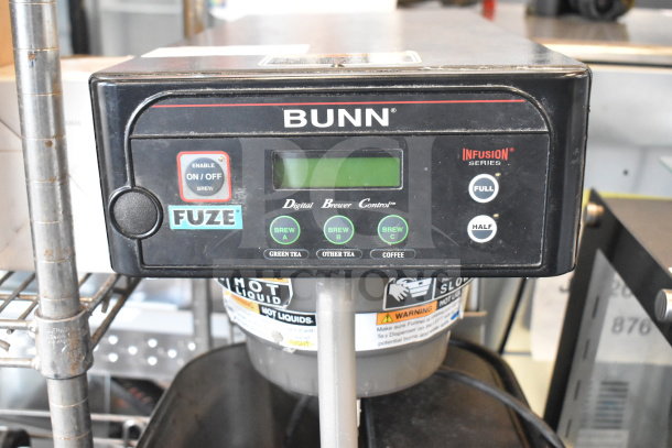 Bunn Commercial Countertop Iced Tea Machine with digital controls, two beverage dispensers, and poly brew basket.