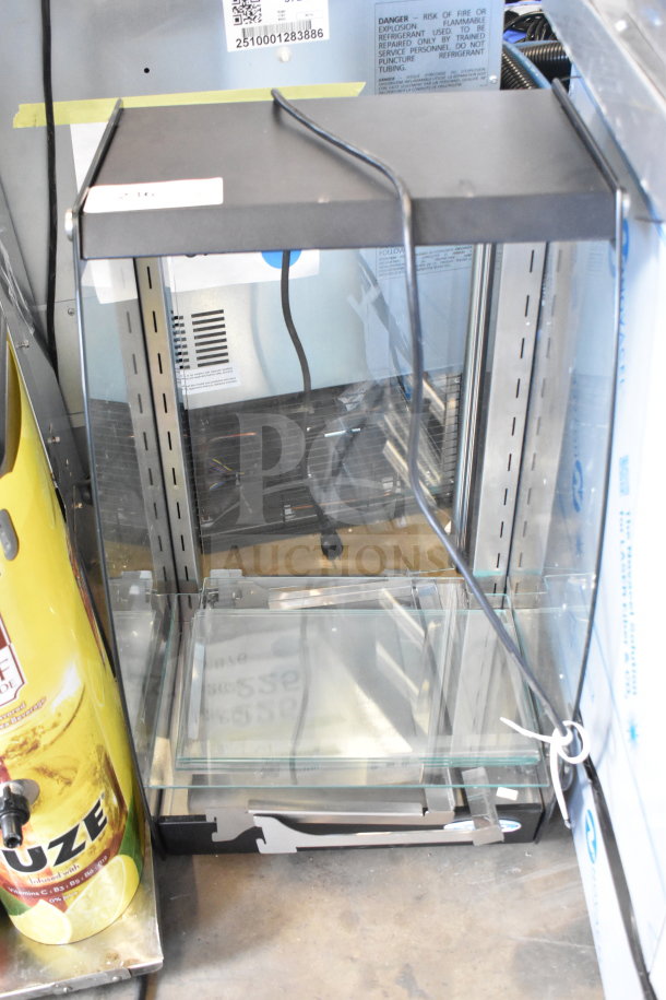 Brand new KoolMore DC-3CB 16" commercial glass bakery display case, self-service, LED lighting, rear door, 2.7 cu. ft., 115V, 1 phase. Scratch and dent condition.