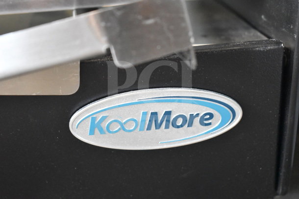 KoolMore DC-3CB display case close-up, showing brand logo. Black finish, part of 16 in. commercial pastry case.
